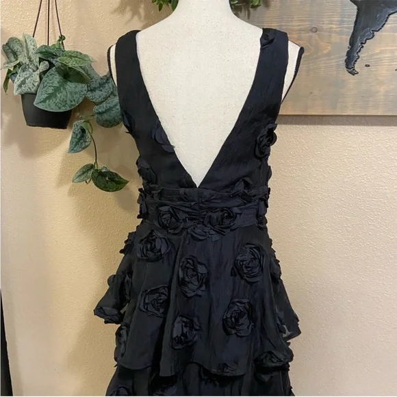 Exceptional Entrance Black Sleeveless Tiered Rosette Midi Dress - Picture 7 of 9
